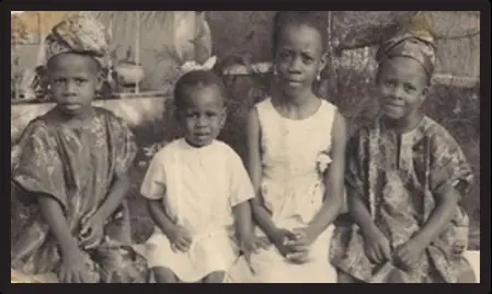 With her siblings.