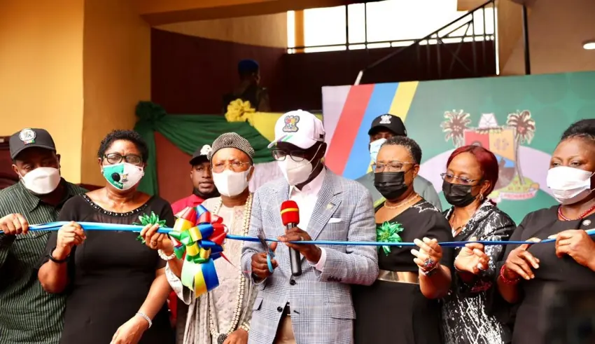 Folasade Adefisayo and Governor Babajide Olusola Sanwo-Olu cutting a ribbon at a school opening.